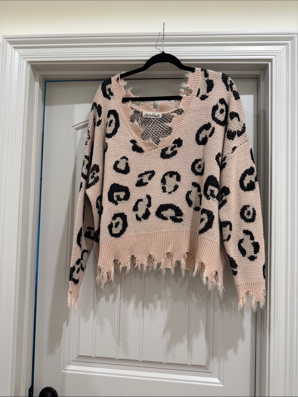 Lulu's Pink and Black Distressed Leopard V-Neck Sweater